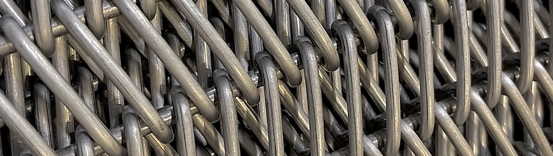 Metal wire intertwined creating background pattern